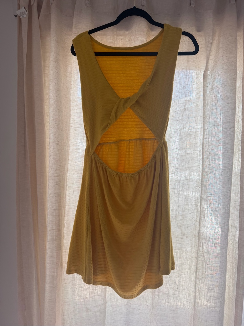 O’Neil Sleeveless Twist-Back Mini Dress in Mustard